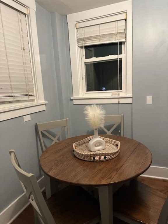 dining area featuring baseboards