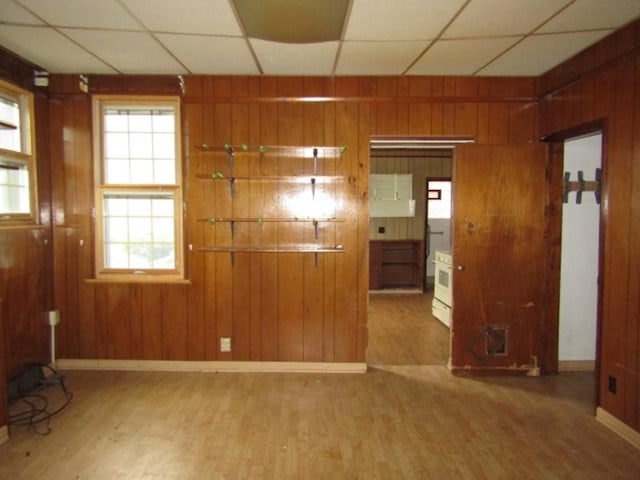 2101 Wharton St, South Side, PA 15203 - spare room featuring wood finished floors, wood walls, baseboards, and a drop ceiling