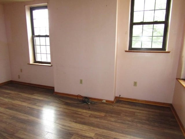 2101 Wharton St, South Side, PA 15203 - spare room featuring plenty of natural light, wood finished floors, and baseboards