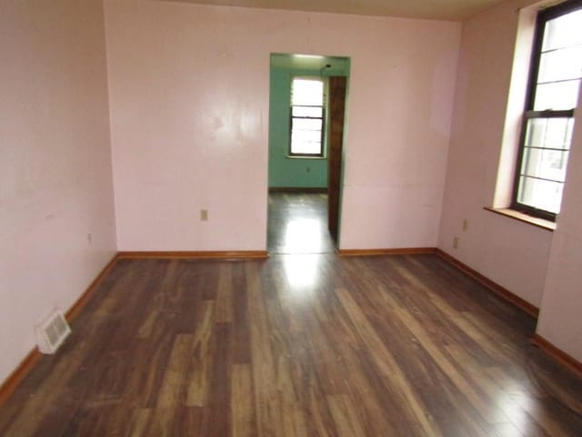 2101 Wharton St, South Side, PA 15203 - spare room with wood finished floors and baseboards