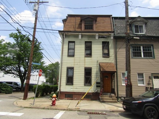 2101 Wharton St, South Side, PA 15203 - second empire-style home featuring entry steps, mansard roof, and a shingled roof