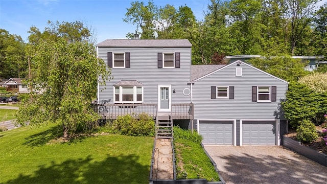 2918 Woodland Cir, Hampton, PA 15101 - traditional-style home featuring an attached garage, driveway, a front lawn, and a deck