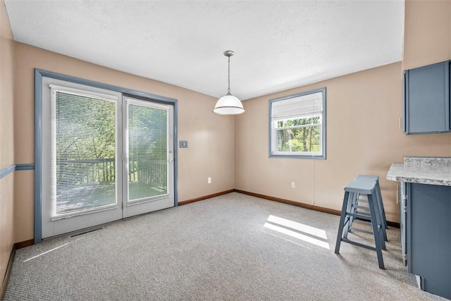 2918 Woodland Cir, Hampton, PA 15101 - unfurnished dining area with carpet floors and baseboards