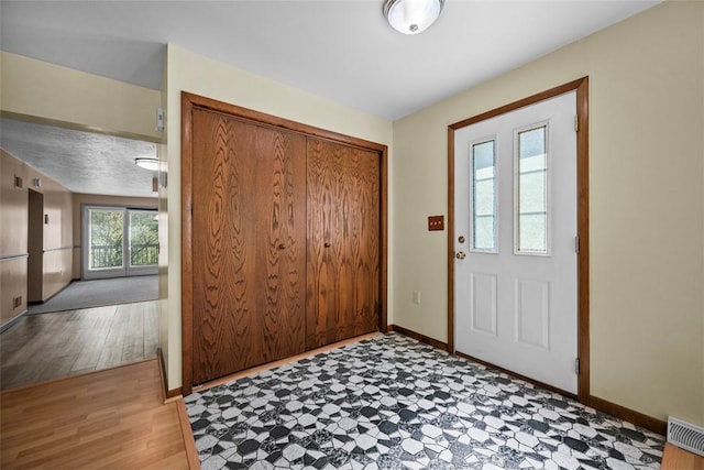 2918 Woodland Cir, Hampton, PA 15101 - entryway featuring baseboards and wood finished floors