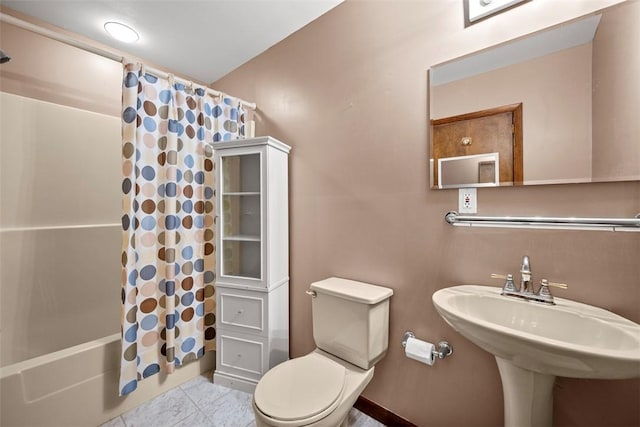 2918 Woodland Cir, Hampton, PA 15101 - bathroom featuring toilet, a sink, and shower / bath combination with curtain