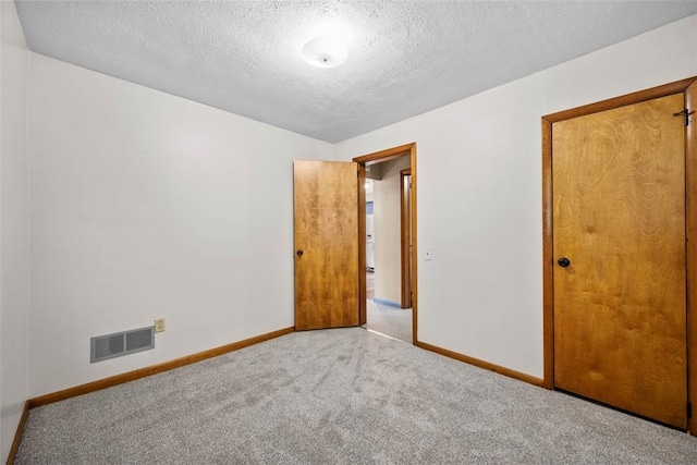 2918 Woodland Cir, Hampton, PA 15101 - spare room with carpet, a textured ceiling, and baseboards