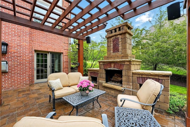 view of patio / terrace featuring an outdoor living space with a fireplace