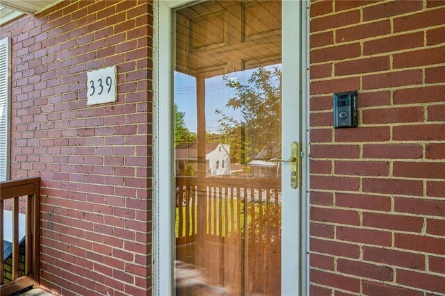 339 Hamil Rd, Penn Hills, PA 15147 - property entrance featuring brick siding