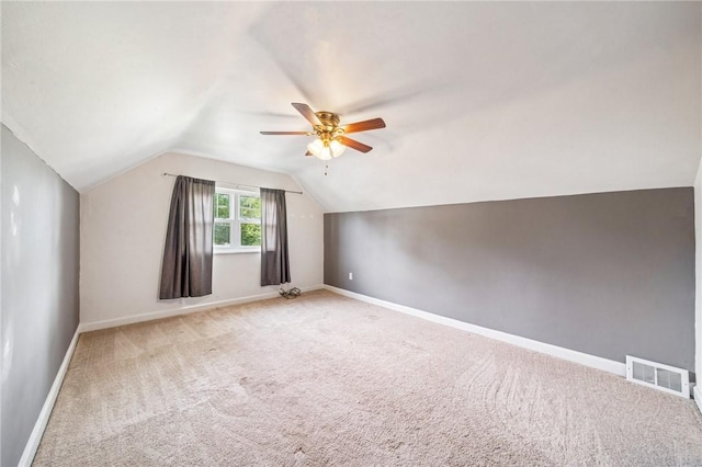 339 Hamil Rd, Penn Hills, PA 15147 - bonus room with ceiling fan, vaulted ceiling, light colored carpet, and baseboards