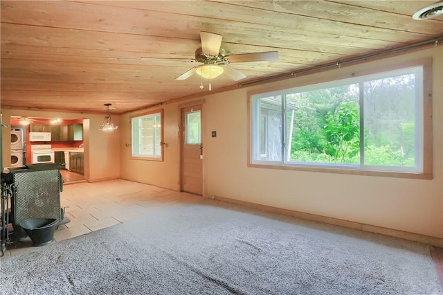 138 Bovard Ln, Cherry Twp, PA 16020 - unfurnished living room with wood ceiling, plenty of natural light, and a ceiling fan