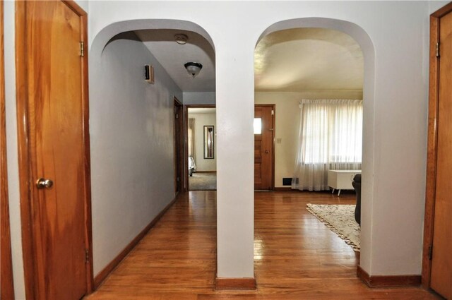 525 Joffre Bulger Rd, Smith, PA 15021 - hall featuring arched walkways, wood finished floors, and baseboards
