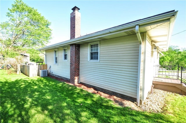 525 Joffre Bulger Rd, Smith, PA 15021 - back of property featuring a chimney, a lawn, and central AC