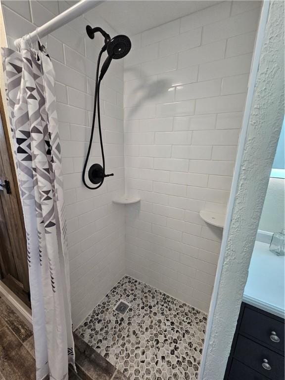 bathroom with a stall shower