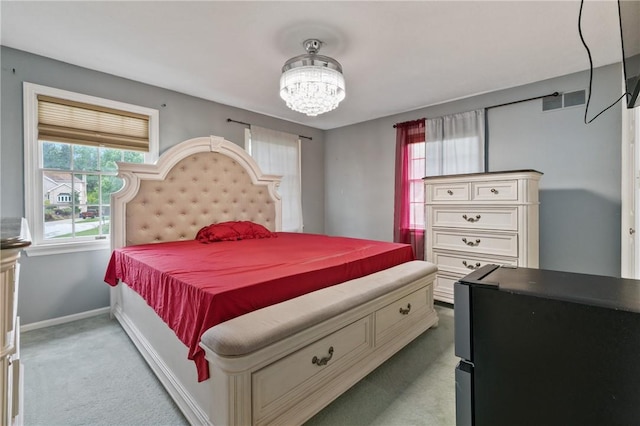 228 Meadowfield Ln, Jefferson Hills, PA 15025 - carpeted bedroom with a chandelier and baseboards