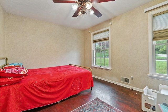 228 Meadowfield Ln, Jefferson Hills, PA 15025 - bedroom with wood finished floors, multiple windows, baseboards, and ceiling fan