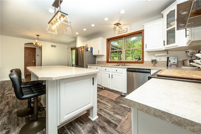 529 Mill Creek Rd, Mill Creek, PA 16362 - kitchen with stainless steel appliances, a sink, white cabinetry, glass insert cabinets, and dark wood-type flooring