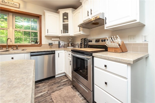 529 Mill Creek Rd, Mill Creek, PA 16362 - kitchen featuring stainless steel appliances, under cabinet range hood, a sink, white cabinetry, and light countertops