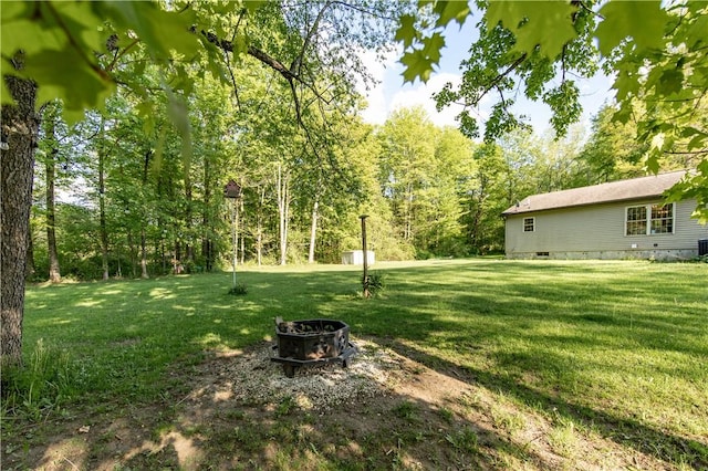 529 Mill Creek Rd, Mill Creek, PA 16362 - view of grassy yard with a fire pit