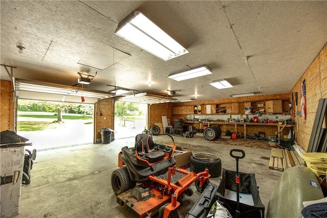 529 Mill Creek Rd, Mill Creek, PA 16362 - garage with a workshop area and a garage door opener