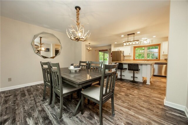 529 Mill Creek Rd, Mill Creek, PA 16362 - dining space with a chandelier, dark wood-style flooring, recessed lighting, and baseboards