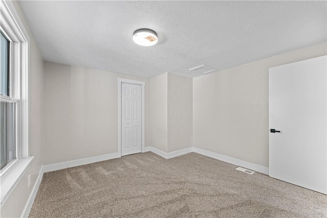 5056 Don St, Finleyville, PA 15332 - carpeted empty room featuring a textured ceiling and baseboards