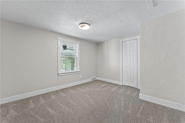 5056 Don St, Finleyville, PA 15332 - carpeted empty room with a textured ceiling and baseboards