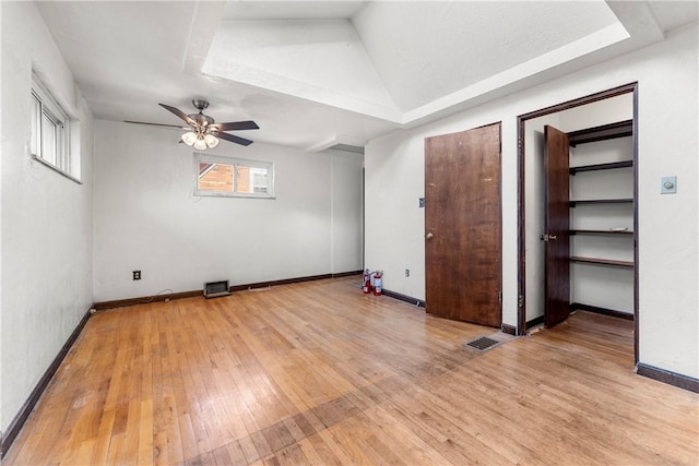 3735 Lyndell St, Castle Shannon, PA 15234 - unfurnished bedroom featuring light wood finished floors, baseboards, a ceiling fan, and a raised ceiling