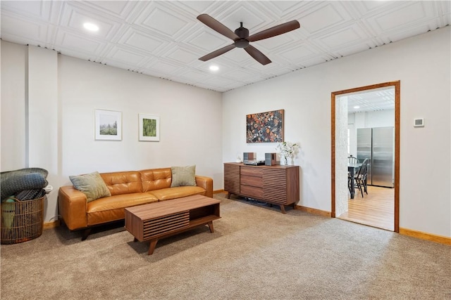 living room with recessed lighting, ceiling fan, light carpet, and baseboards