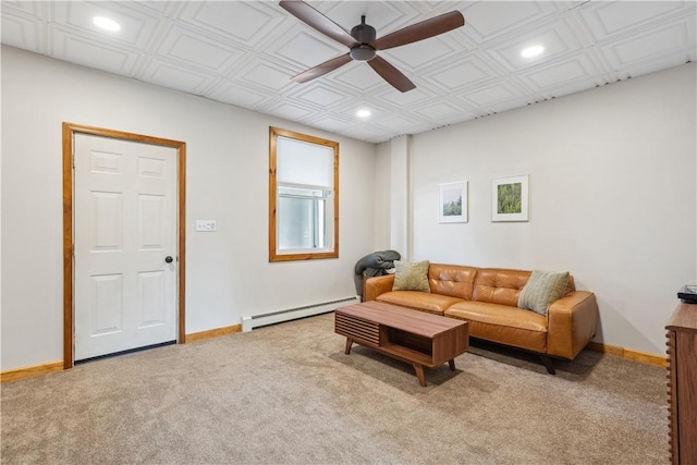 living area featuring a baseboard heating unit, ceiling fan, recessed lighting, carpet floors, and baseboards