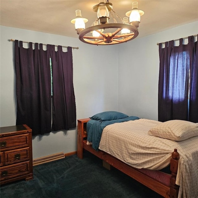 148 James St, Chippewa Twp, PA 15010 - bedroom featuring a chandelier, dark carpet, and baseboards