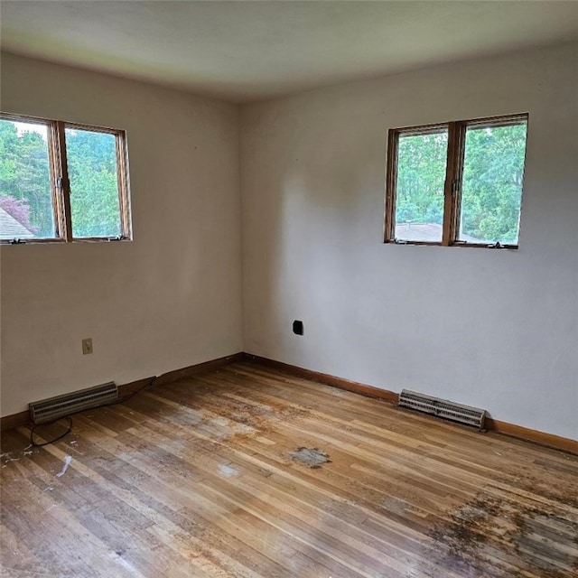 148 James St, Chippewa Twp, PA 15010 - unfurnished room featuring wood-type flooring and baseboards