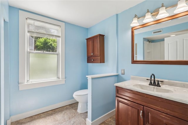 506 7th Ave, Coraopolis, PA 15108 - bathroom with baseboards, vanity, and toilet