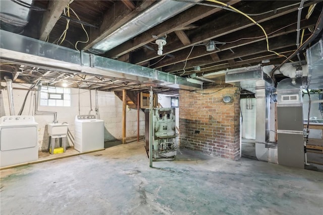 506 7th Ave, Coraopolis, PA 15108 - below grade area featuring washer and clothes dryer and a sink