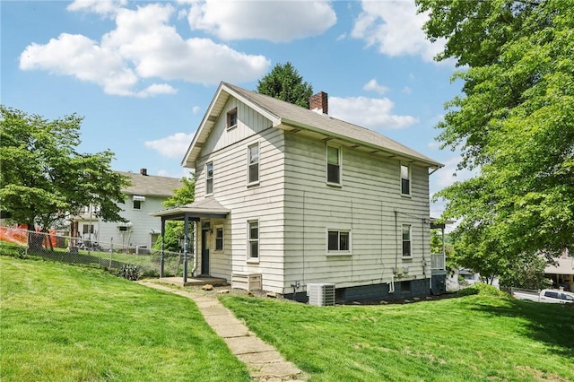 506 7th Ave, Coraopolis, PA 15108 - back of house with a chimney and central air condition unit