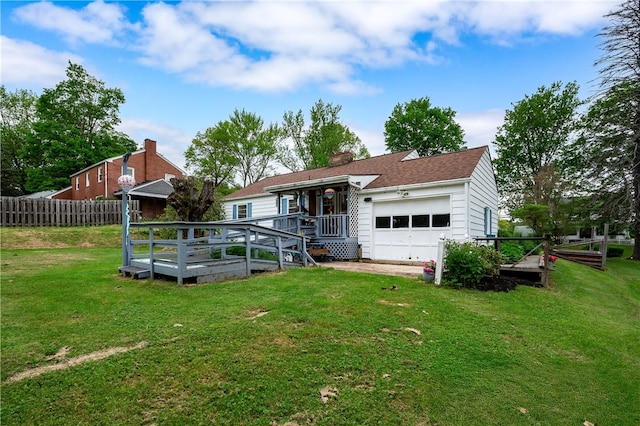 132 W Main St, Greenville Boro Mer, PA 16125 - rear view of property featuring a garage, driveway, and a chimney