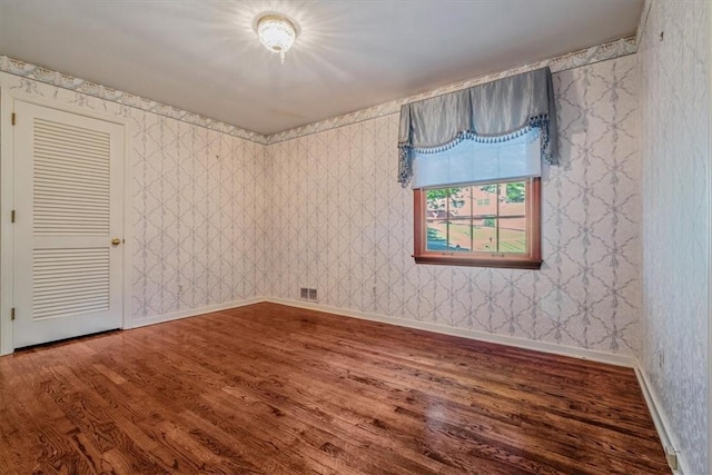 2652 Thorntree Dr, Upper St Clair, PA 15241 - spare room featuring wallpapered walls, wood finished floors, and baseboards