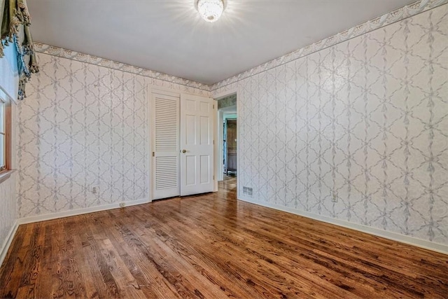 2652 Thorntree Dr, Upper St Clair, PA 15241 - unfurnished room with wallpapered walls, wood finished floors, and baseboards