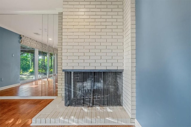 2652 Thorntree Dr, Upper St Clair, PA 15241 - detailed view of a brick fireplace, baseboards, and wood finished floors