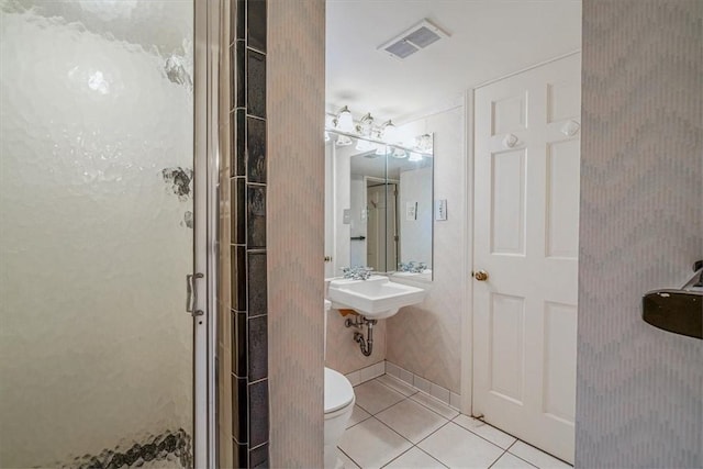 2652 Thorntree Dr, Upper St Clair, PA 15241 - bathroom featuring a shower stall, tile patterned flooring, toilet, and a sink
