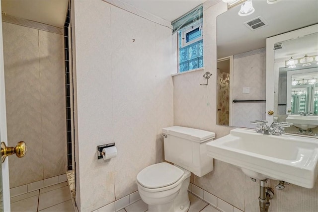 2652 Thorntree Dr, Upper St Clair, PA 15241 - bathroom with toilet, tile patterned floors, and a sink