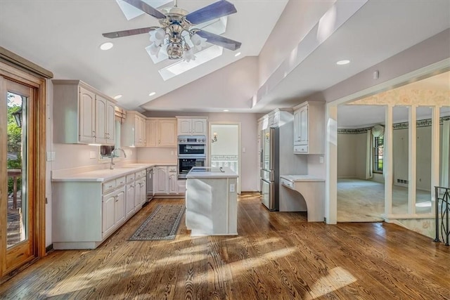 2652 Thorntree Dr, Upper St Clair, PA 15241 - kitchen featuring a skylight, appliances with stainless steel finishes, ceiling fan, light countertops, and recessed lighting