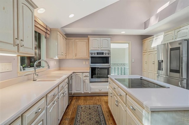 2652 Thorntree Dr, Upper St Clair, PA 15241 - kitchen with stainless steel appliances, a sink, dark wood-type flooring, recessed lighting, and a center island