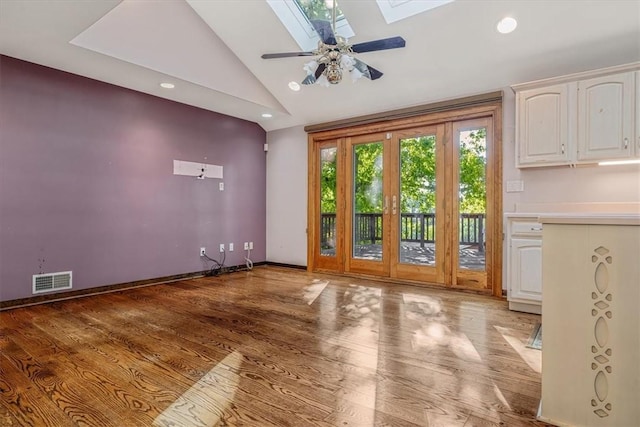 2652 Thorntree Dr, Upper St Clair, PA 15241 - entryway featuring lofted ceiling, a skylight, light wood finished floors, a ceiling fan, and recessed lighting