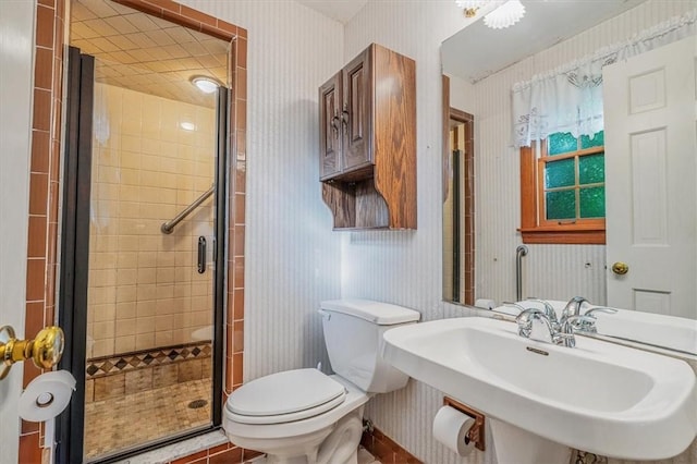 2652 Thorntree Dr, Upper St Clair, PA 15241 - bathroom featuring wallpapered walls, a sink, a shower stall, and toilet