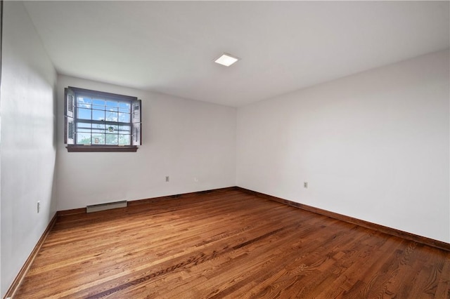 677 Harrogate Rd, Upper St Clair, PA 15241 - spare room with wood finished floors and baseboards