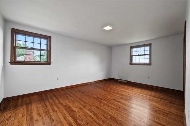 677 Harrogate Rd, Upper St Clair, PA 15241 - unfurnished room featuring wood finished floors and baseboards
