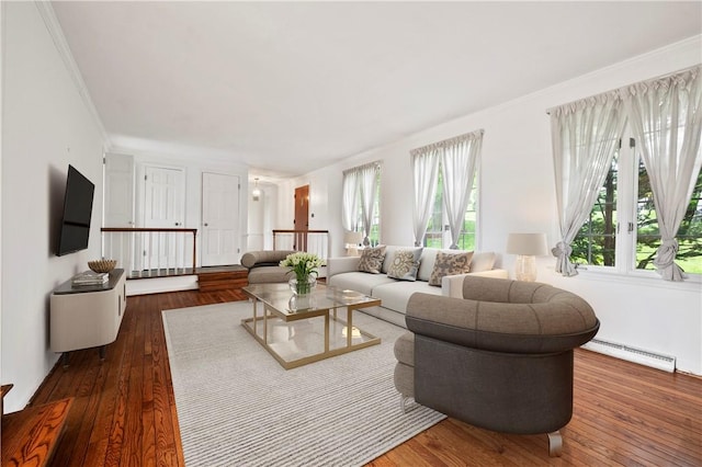 677 Harrogate Rd, Upper St Clair, PA 15241 - living area with a baseboard radiator, dark wood-type flooring, and ornamental molding