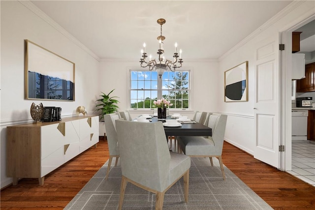677 Harrogate Rd, Upper St Clair, PA 15241 - dining room with a chandelier, dark wood finished floors, and ornamental molding