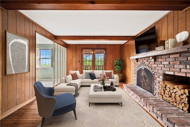 677 Harrogate Rd, Upper St Clair, PA 15241 - living area with wood walls, hardwood / wood-style flooring, beamed ceiling, and a fireplace