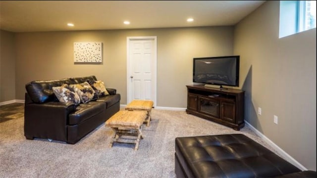 carpeted living room featuring recessed lighting and baseboards